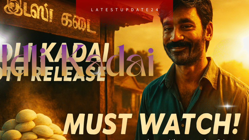 Idli Kadai Dhanush serving idli to a customer with a gentle smile